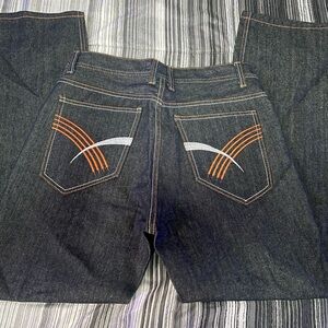 Stylish Dark Blue Jeans with Orange and White Accents